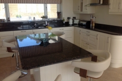 Tan Brown Granite Worktop with Ogee Edge on Island & Recessed Draining Board