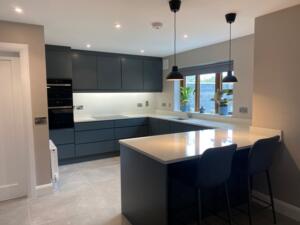 Carrara Quartz Worktop, Upstands, Cladding on Hob Wall & Window Board